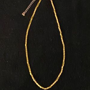 Faux gold necklace of gold color rectangle blocks